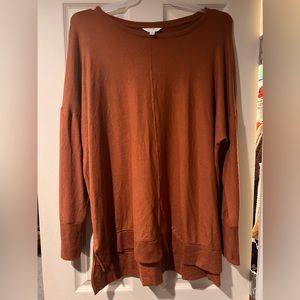 Burnt orange flowy sweater.